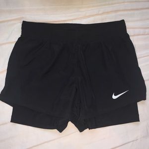 Women’s Nike black shorts with compression (XS)